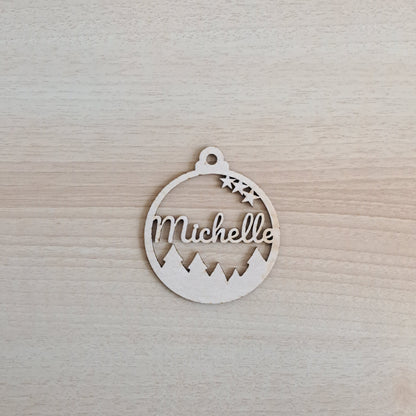 laser cut ornament with three stars and five trees and name Michelle cut